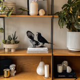 Pīwakawaka Woodenbird